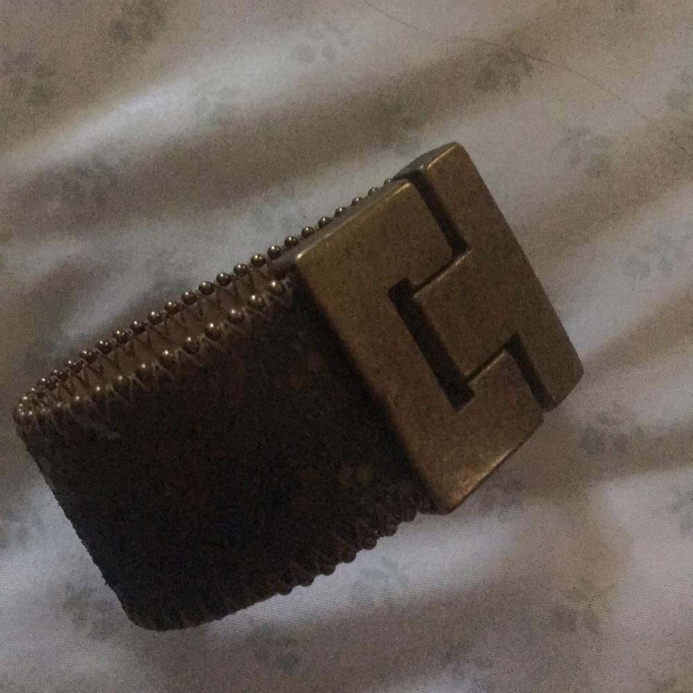 Gold and greenish black cuff